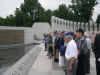 Vets looking at WWII Star wall.JPG (444930 bytes)